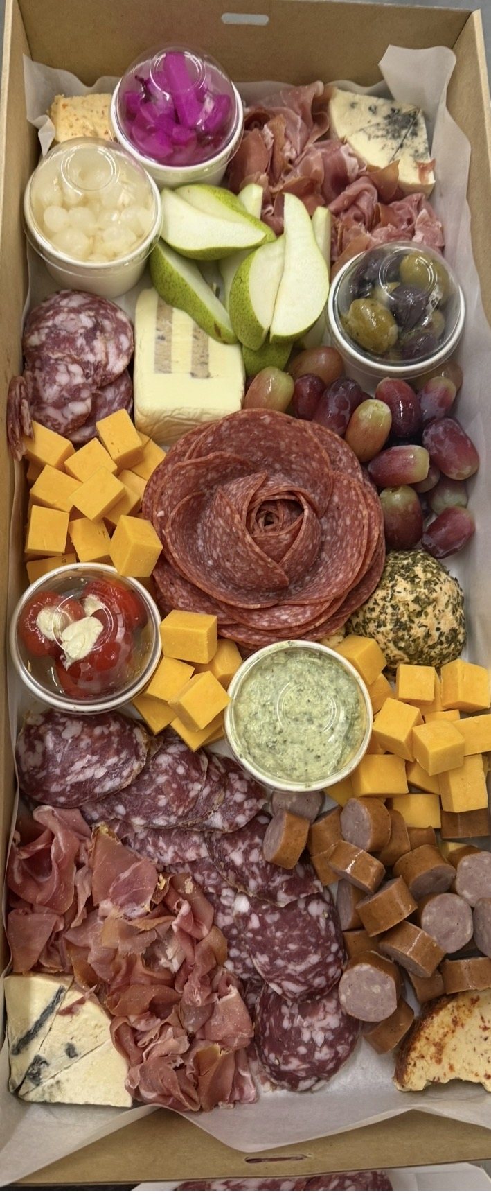 Selected cheeses, charcuterie and accompaniments